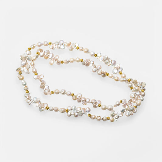 Lange Perlenkette mit Barockperlen & vergoldeten Akzenten