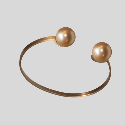 Armreif aus 750er Gold mit Südsee-Perlen – Pure Eleganz